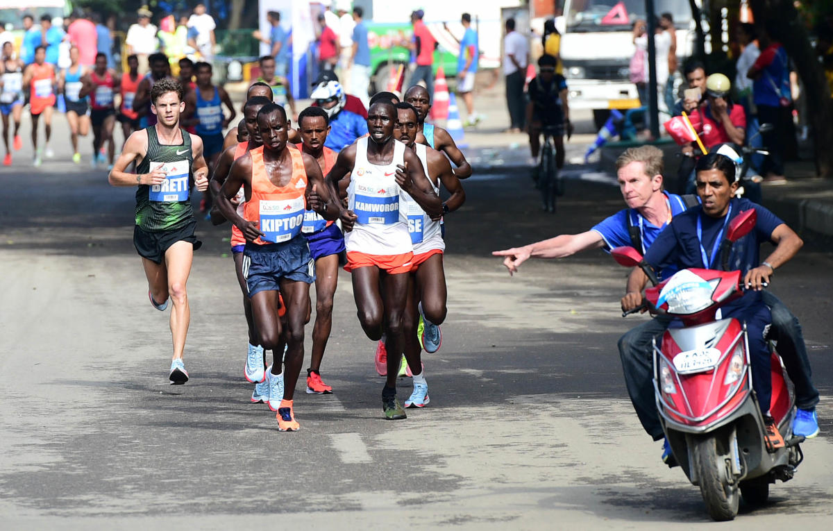 International athletes running during the elite men section marathon at M G Road for TCS World 10K run held at Sree Kanteerava Stadium in Bengaluru on Sunday.DH Photo