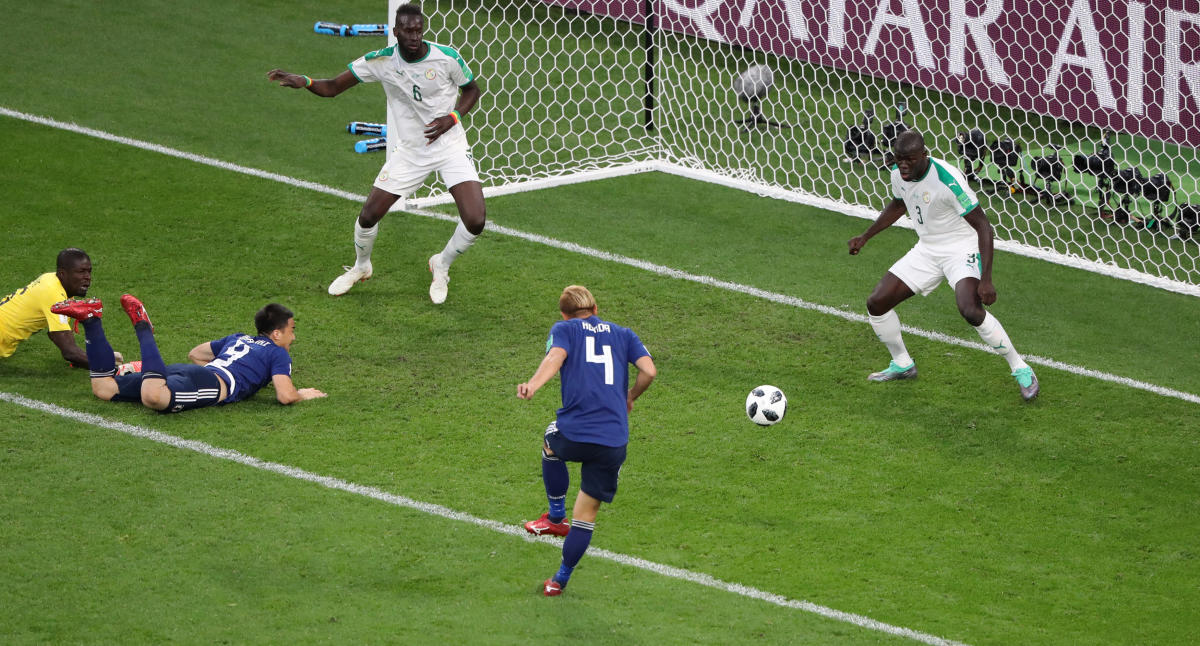 Soccer Football - World Cup - Group H - Japan vs Senegal - Ekaterinburg Arena, Yekaterinburg, Russia - June 24, 2018 Japan's Keisuke Honda scores a goal REUTERS