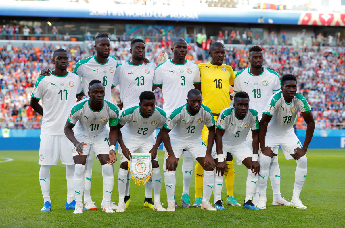 Soccer Football - World Cup - Group H - Japan vs Senegal - Ekaterinburg Arena, Yekaterinburg, Russia - June 24, 2018 Senegal players pose for a team group photo before the match REUTERS