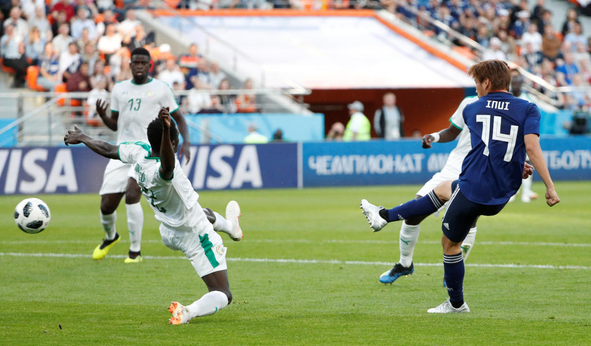 Soccer Football - World Cup - Group H - Japan vs Senegal - Ekaterinburg Arena, Yekaterinburg, Russia - June 24, 2018 Japan's Takashi Inui scores their first goal REUTERS