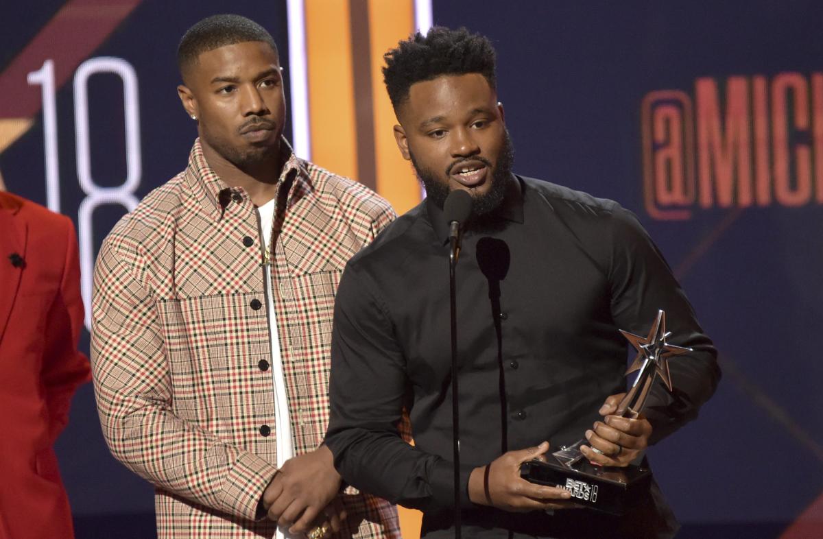 Michael B. Jordan, left, and Ryan Coogler accept the best movie award for