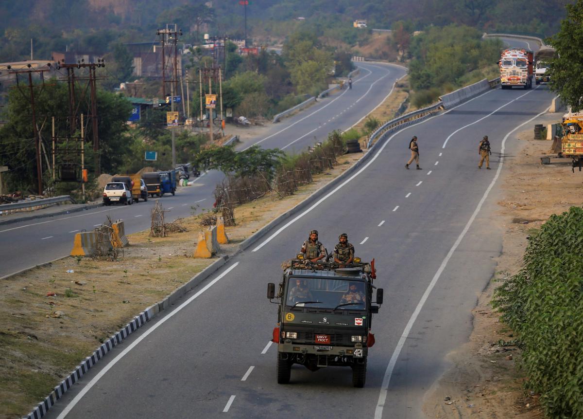 Security personnel keep vigil near Jammu-Srinagar National Highway ahead of the annual Amarnath Yatra, which commences tomorrow, in Jammu on Tuesday, June 26, 2018. PTI