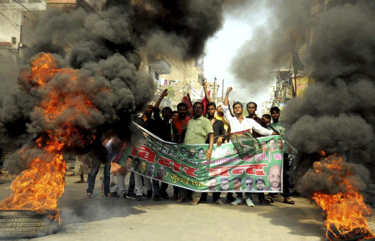 Jan Adhikar Party supporters raise slogan a protest rally during the Bihar Bandh cell for special status to the state, in Patna on Saturday, July 7, 2018. ( PTI Photo)