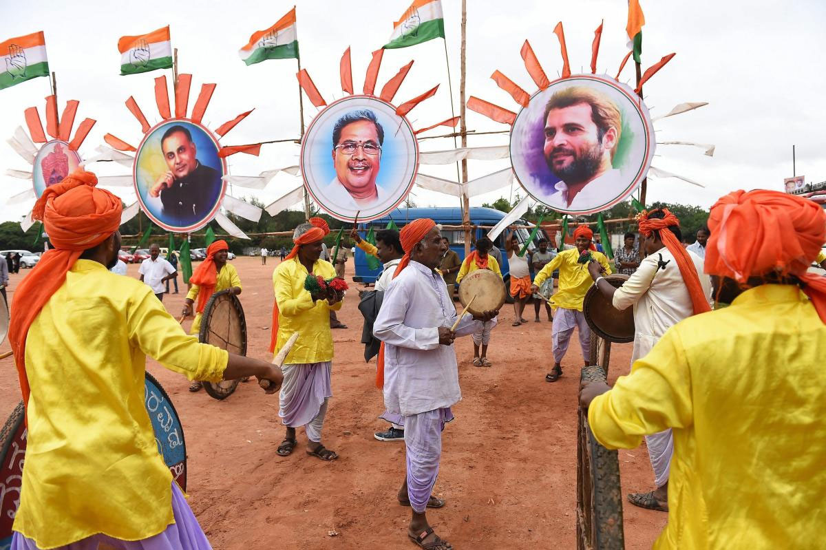 Local folk artists perform during a ceremony to take charge of the office of KPCC's newly-appointed President Dinesh Gundu Rao, in Bengaluru on Wednesday, July 11, 2018. PTI Photo