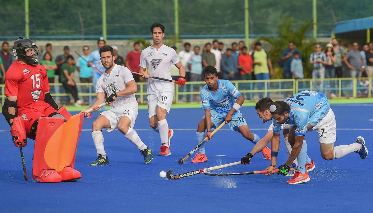 India's Akashdeep Singh and New Zealand's Rose Nick vie for the ball during third match of three test match series at Sports Authority of India, in Bengaluru. (PTI Photo)