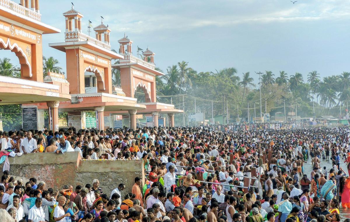 Devotees perform rituals near the Sri Ramanthaswamy temple on the occasion of