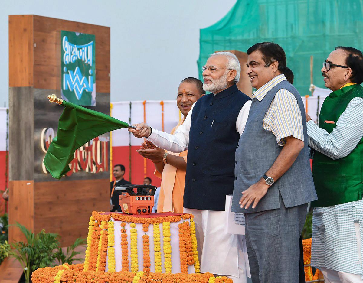 Prime Minister Narendra Modi inaugurates India's first multi-modal terminal on the Ganga river, in Varanasi, Monday, Nov 12, 2018. Also seen are Union Transport Minister Nitin Gadkari, Uttar Pradesh Chief Minister Yogi Adityanath and UP BJP chief Mahendra Nath Pandey. (PIB Photo via PTI)