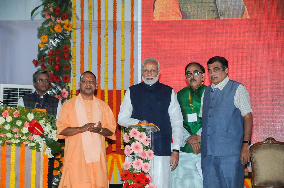 Prime Minister Narendra Modi inaugurates India's first multi-modal terminal on the Ganga river, in Varanasi, Monday, Nov 12, 2018. Also seen are Union Transport Minister Nitin Gadkari, Uttar Pradesh Chief Minister Yogi Adityanath and UP BJP chief Mahendra Nath Pandey. (PTI Photo)