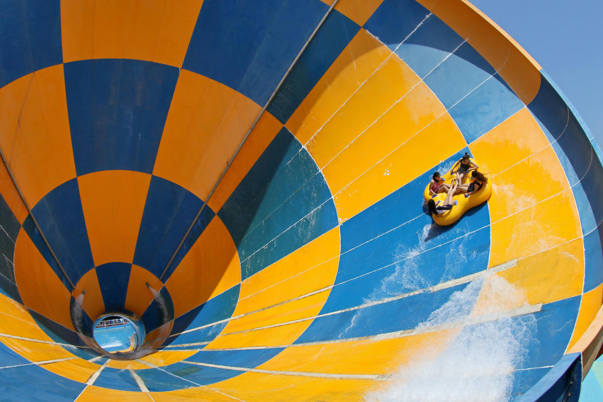Visitors enjoy a slide at the 37 Degree Dream Sea Waterpark in Yantai, Shandong province, China June 7, 2019. REUTERS/Stringer