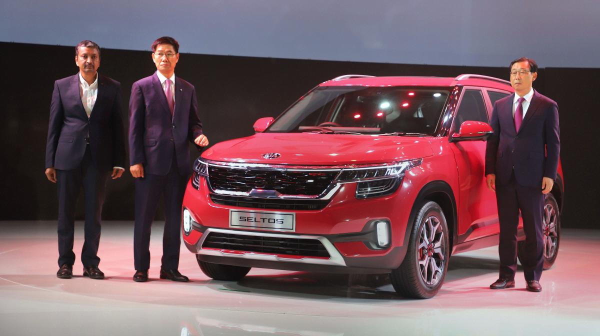 President and CEO of Kia Motors Corporation Han Wu Park, Managing Director Kia Motors India Kookhyun Shim and Vice President & Head of Sales and Marketing, Manohar Bhat, during the launch of Kia Seltos SUV, in Gurugram, Thursday, June 20, 2019. PTI