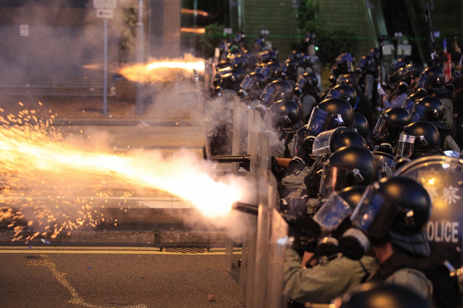 Hong Kong police fire tear gas at protesters in Sai Wan, Hong Kong. (PTI)