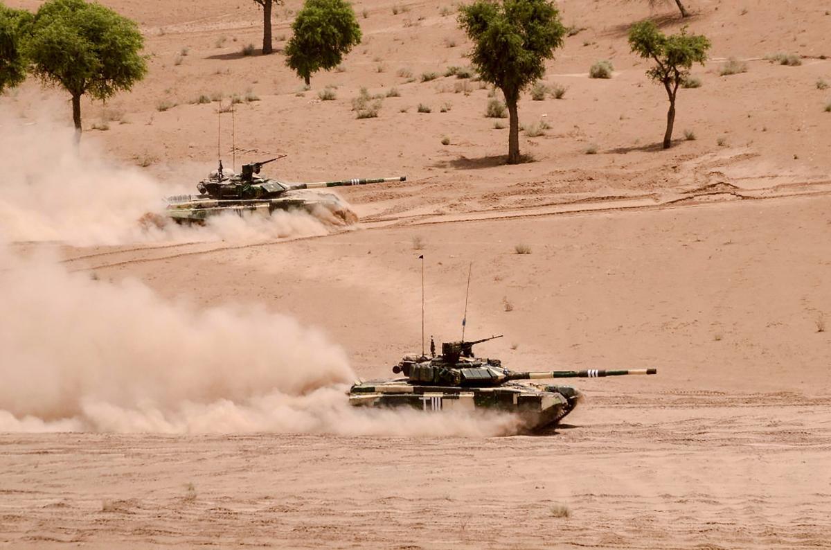 Army tanks participate in 'Vijay Prahar' military exercise at Mahajan Field Firing Range near Bikaner in Rajasthan on Wednesday.
