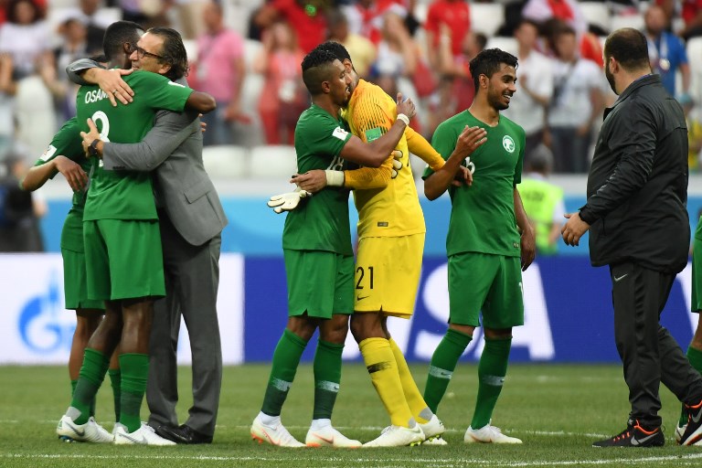 Saudi Arabia's players celebrate winning the Russia 2018 World Cup Group A football match between Saudi Arabia and Egypt at the Volgograd Arena in Volgograd on June 25, 2018. Source: PHILIPPE DESMAZES / AFP