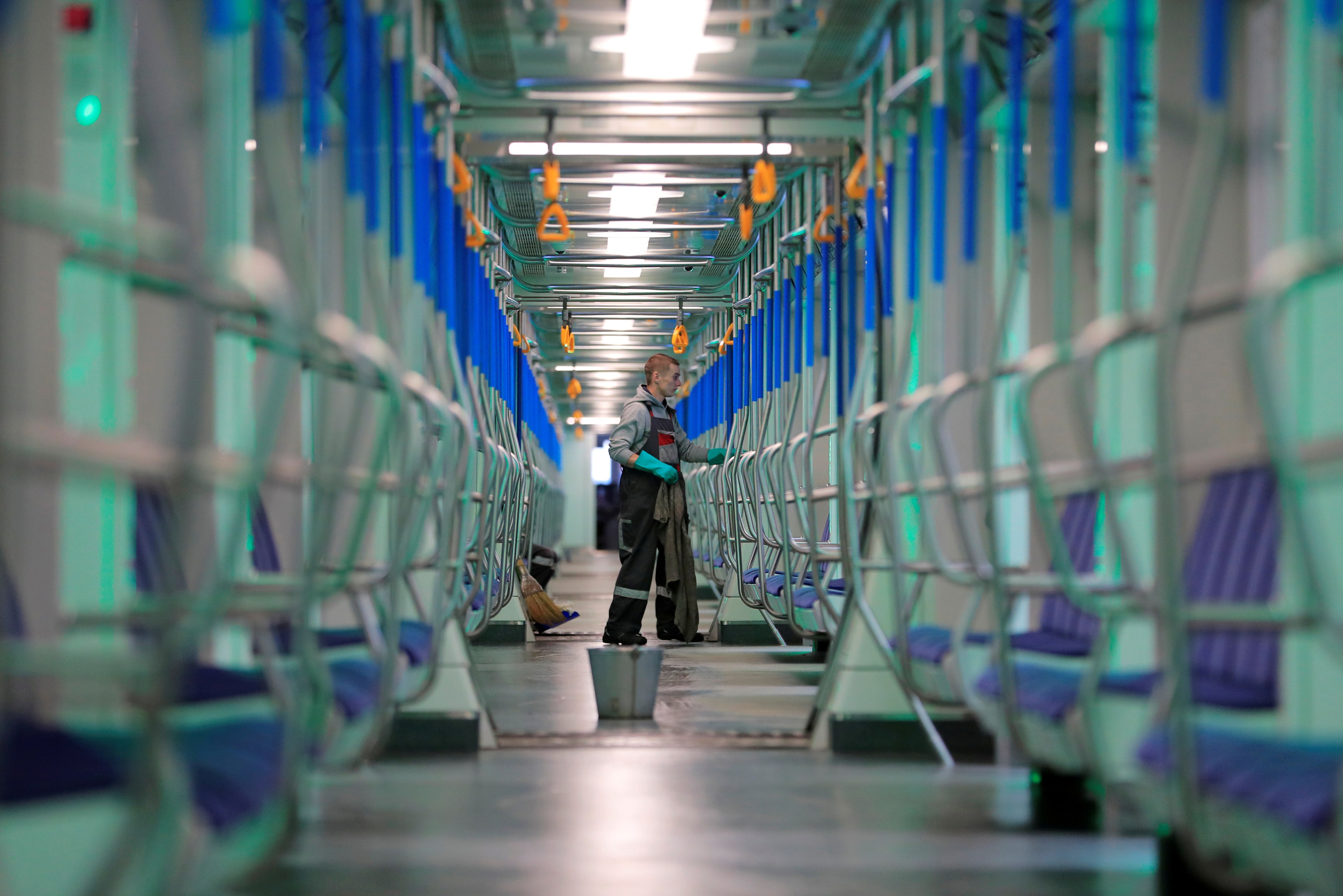 A man disinfects a subway station in Russia. (Credit: Reuters)