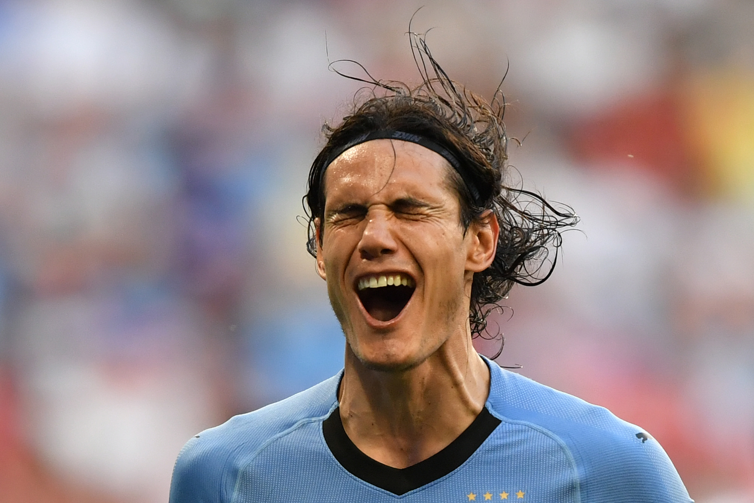 Uruguay's forward Edinson Cavani celebrates after scoring a goal during the Russia 2018 World Cup Group A football match between Uruguay and Russia at the Samara Arena in Samara on June 25, 2018. Source: Fabrice COFFRINI / AFP