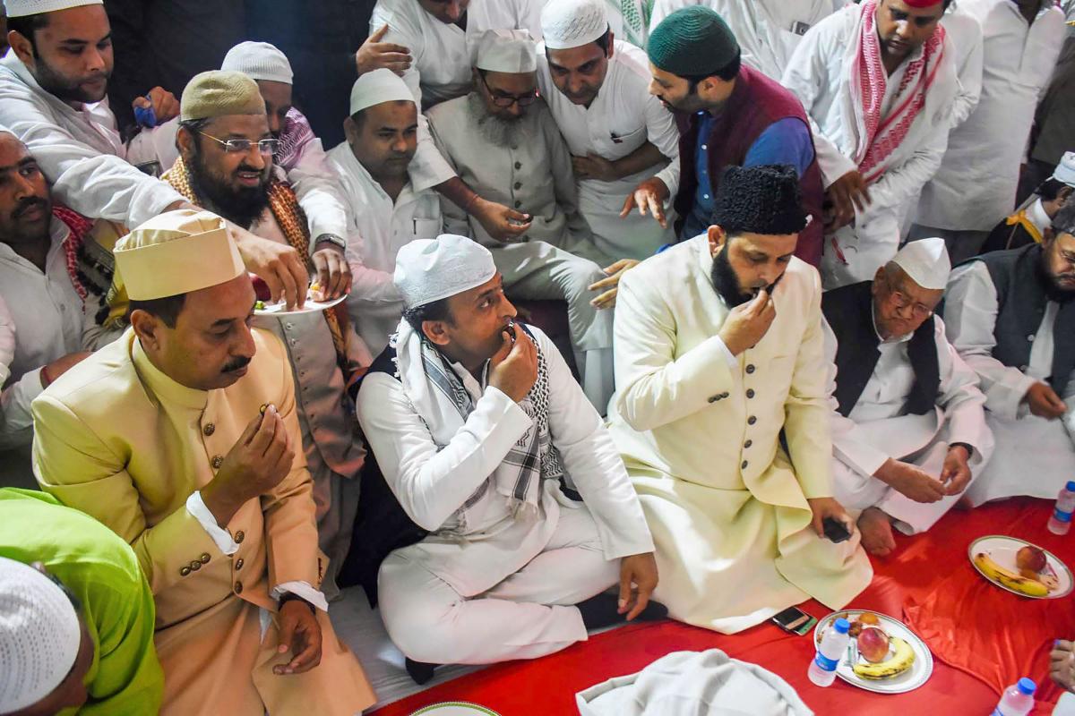 Samajwadi Party chief and former Uttar Pradesh chief minister Akhilesh Yadav hosts an Iftar party at Taj Hotel, in Lucknow on Monday. PTI Photo