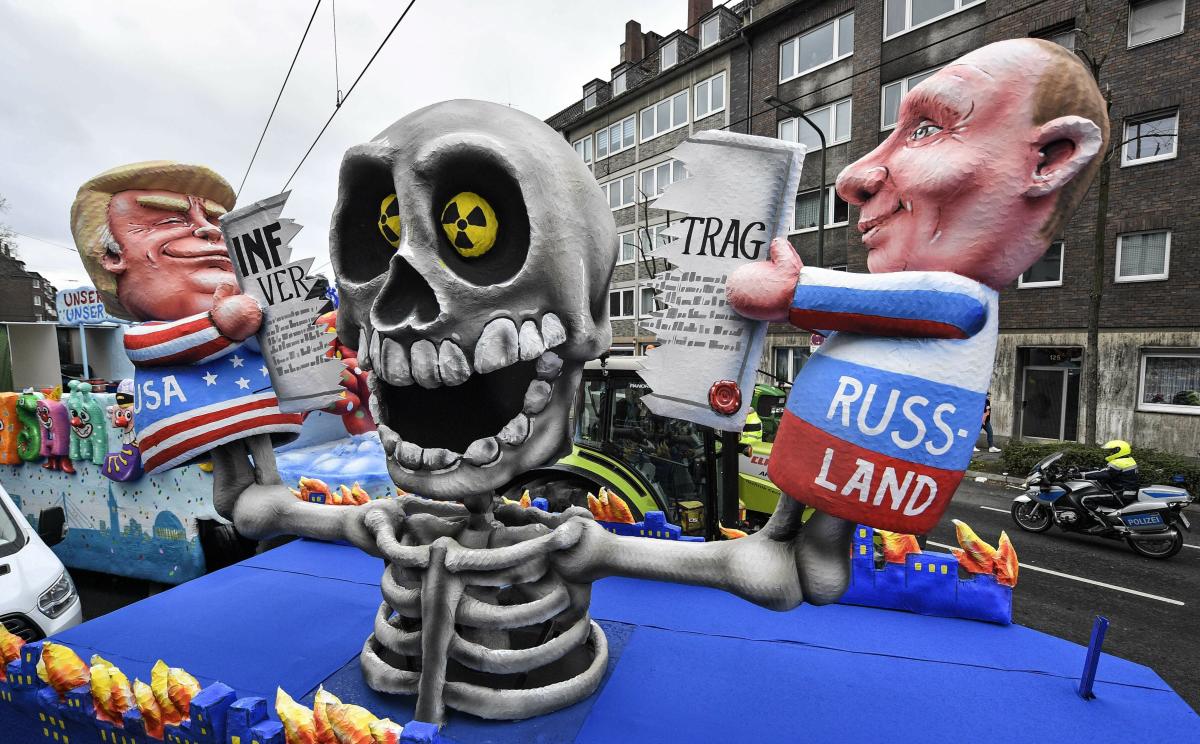 A carnival float depicts Donald Trump and Vladimir Putin cutting the INF Treaty prior to the traditional carnival parade in Duesseldorf. The foolish street spectacles in the carnival centers of Duesseldorf, Mainz and Cologne, watched by hundreds of thousands of people, are the highlights in Germany's carnival season on Rose Monday. AP/PTI