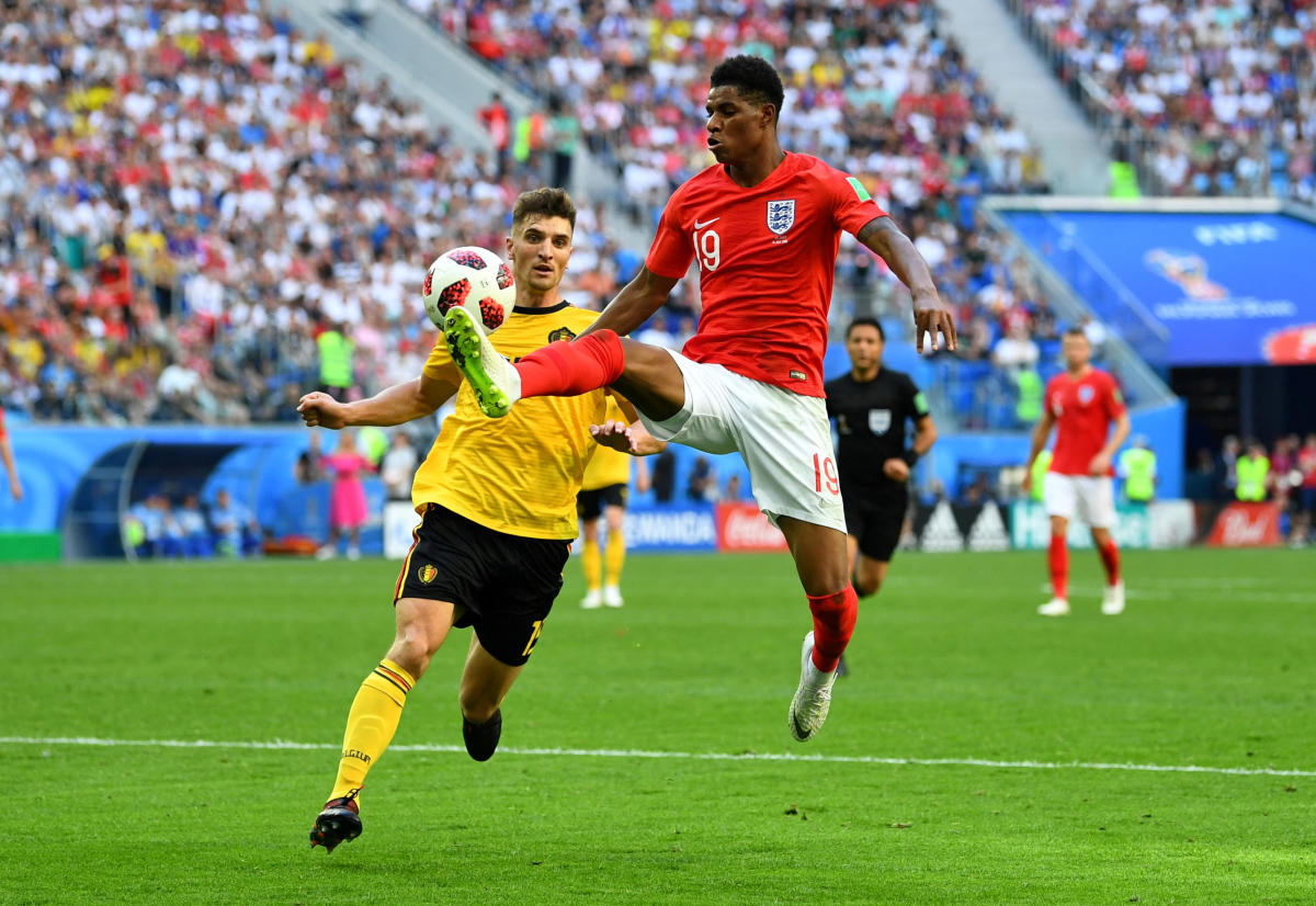 England's Marcus Rashford in action with Belgium's Thomas Meunier. Reuters  Photo