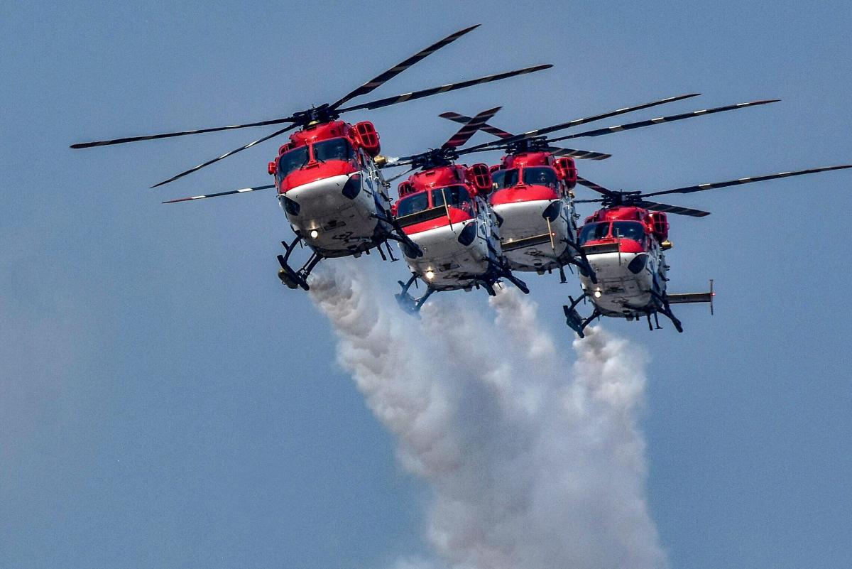 IAF's Sarang display team performs during a ceremony for the presentation of President's Colours to Air Force Station, Hakimpet & 5 Base Repair Depot at AF Station, Sulur in Tamil Nadu. PTI