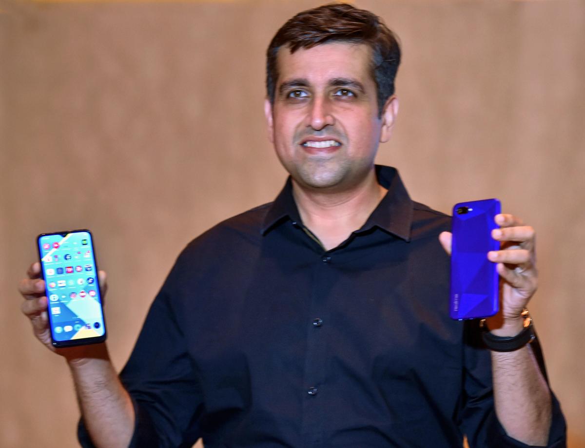 Realme India CEOMadhav Sheth launches Realme C2 and Realme 3pro mobile phones in Kolkata, Wednesday, June 19, 2019. PTI