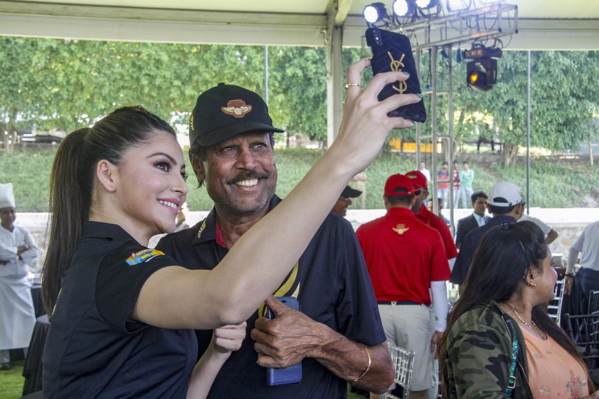 Former cricketer Kapil Dev and actress Urvashi Rautela at the 4th edition of Krishnapatnam Golden Eagles Golf Championship. PTI photo