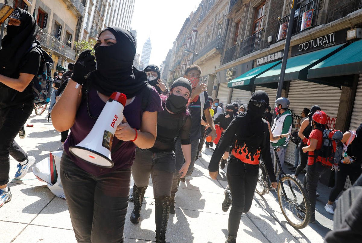 Demonstrators march against police violence days after riot police officers kicked a protester in the head, while demonstrating against the deaths of George Floyd in the U.S. and Giovanni Lopez in Mexico, in Mexico City, Mexico. Credit/Reuters Photo