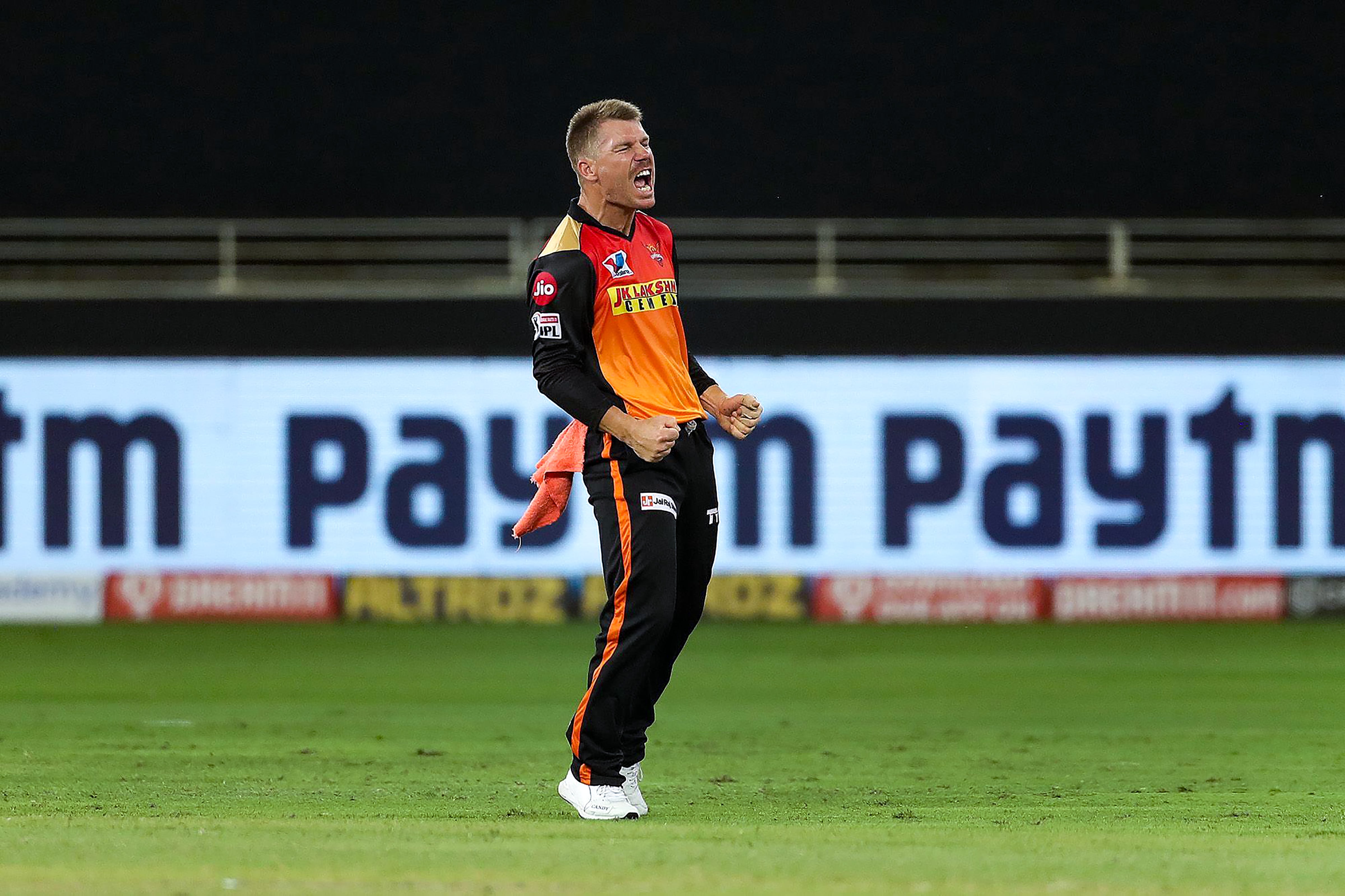 Sunrisers Hyderabad player David Warner celebrates the wicket of Chennai Super Kings batsman Kedar Jadhav. Credit: PTI