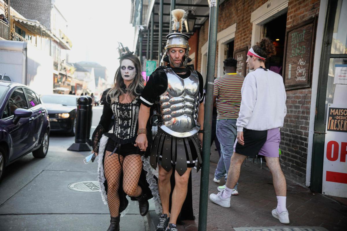 Costumed revelers enjoy the festivities in the French Quarter in New Orleans on Halloween night. Credit: AFP Photo