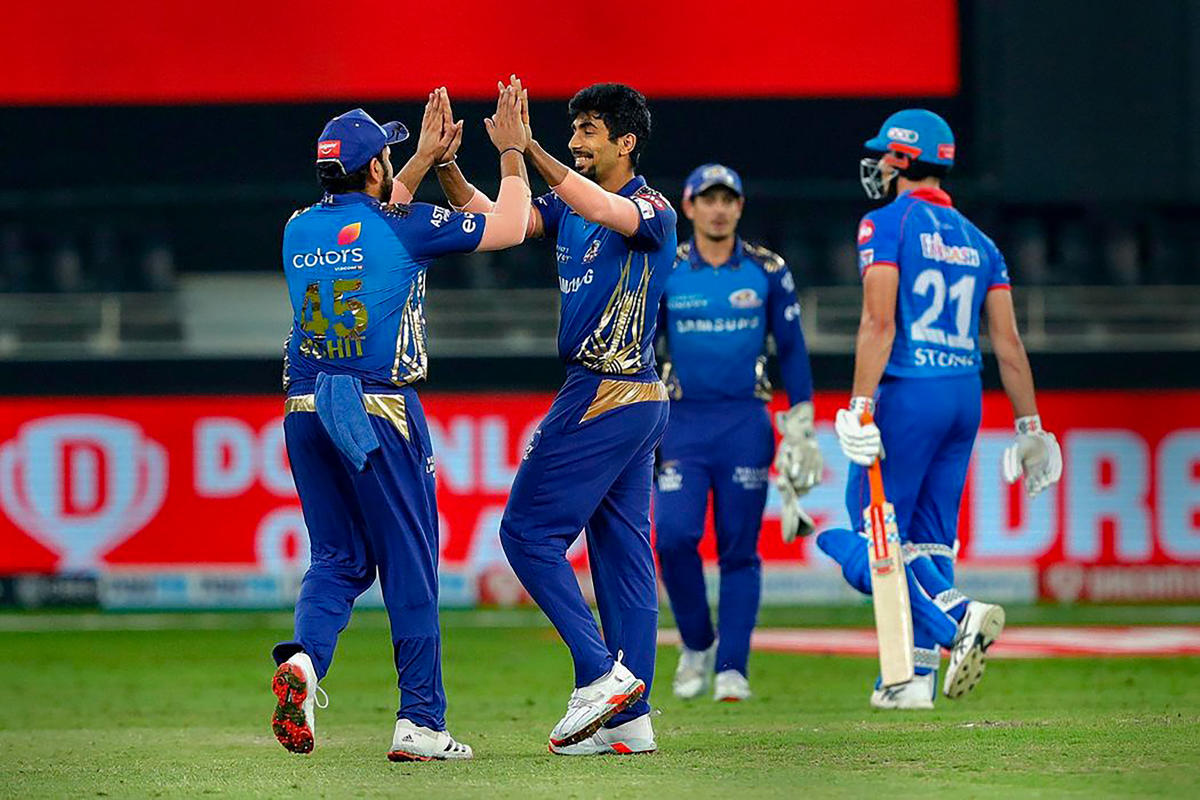 Mumbai Indians' Jasprit Bumrah celebrates the wicket of Marcus Stoinis of Delhi Capitals. Credit: PTI Photo