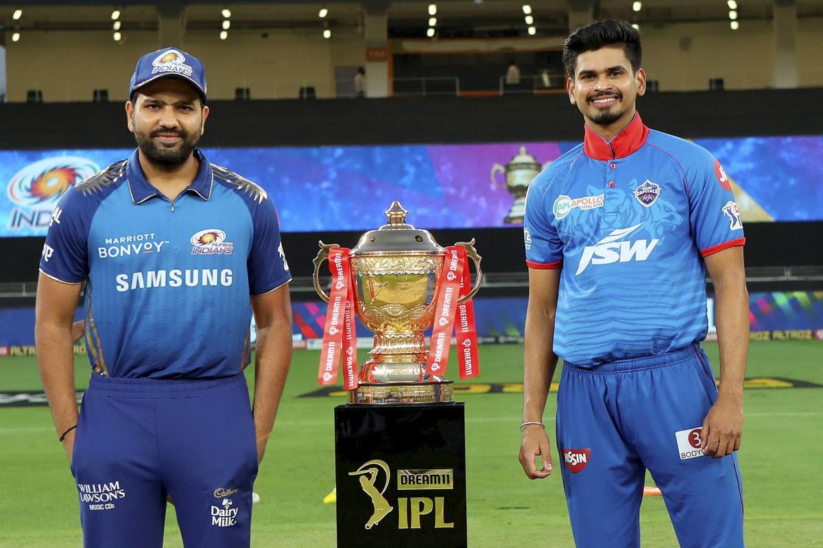 Delhi Capitals captain Shreyas Iyer and Mumbai Indians captain Rohit Sharma during the toss for the final cricket match of the Indian Premier League (IPL) T20, at Dubai International Cricket Stadium in Dubai. Credit: PTI Photo