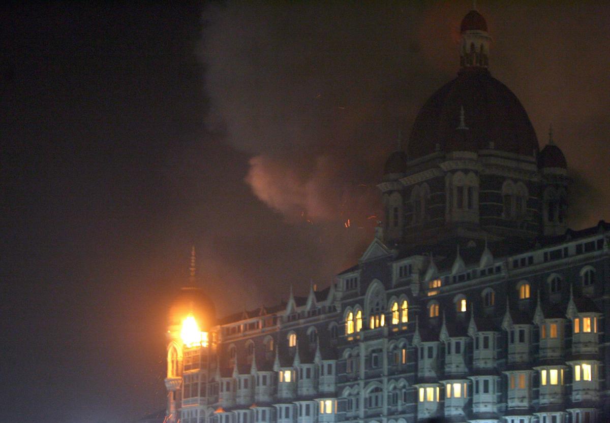 8. India | Fire and smoke is seen during an attack at the Taj Mahal Palace hotel in Mumbai. Ten years ago Islamist militants from Pakistan laid siege to India's financial capital Mumbai for three days, killing 166 people and injuring hundreds more. Credit: AFP Photo