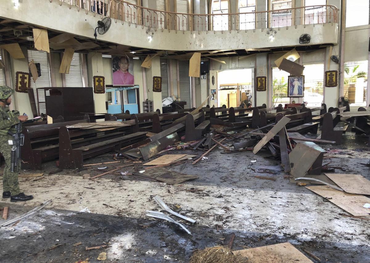10. Philippines | A soldier views the site inside a Roman Catholic cathedral in Jolo, the capital of Sulu province in the southern Philippines after two bombs exploded Sunday, Jan. 27, 2019. Credit: AP/PTI Photo