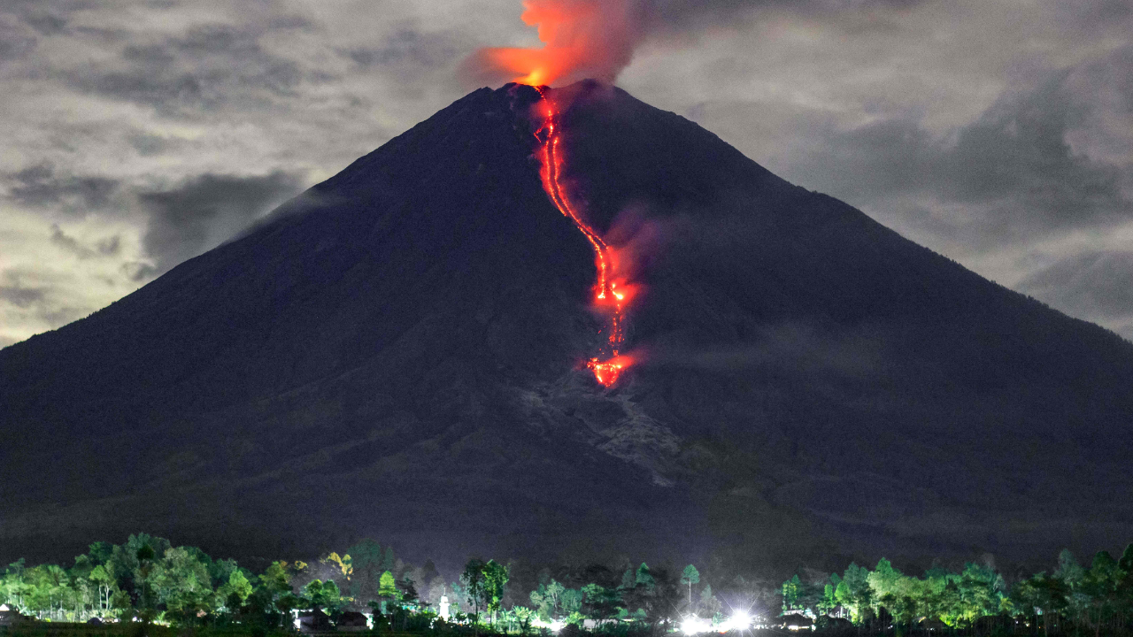 In this picture taken on January 16, 2021, lava is seen during an eruption of Mount Semeru in Lumajang, East Java, Indonesia. Credit: AFP Photo