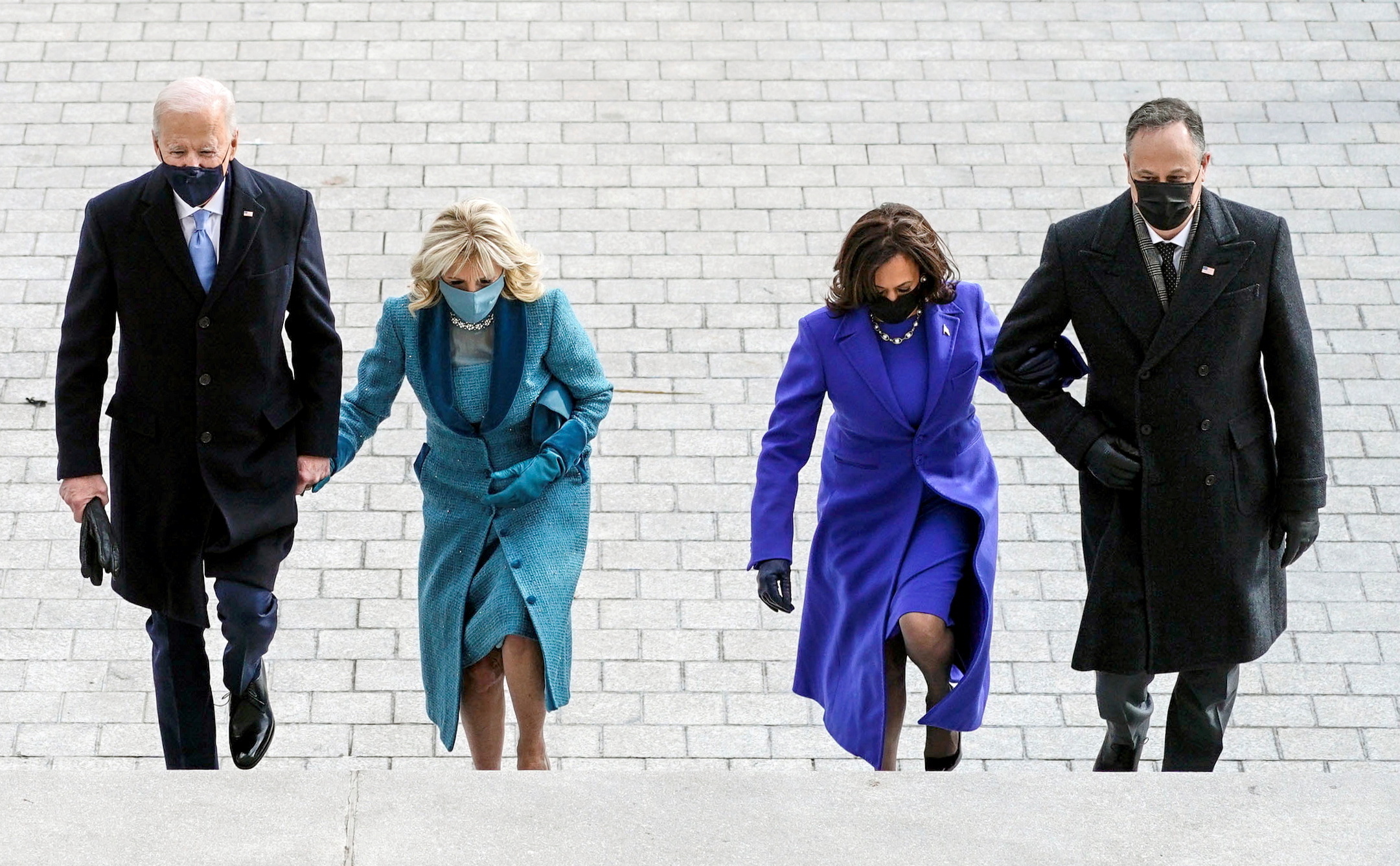 From left, Amy Klobuchar, D-MN, Senator Roy Blunt, R-MO, President-elect Joe Biden, Jill Biden, Vice President-elect Kamala Harris and Doug Emhoff, arrive at the steps of the US Capitol ahead of the inauguration of President Joe Biden in Washington, DC, US January 20, 2021. Credit: Reuters Photo