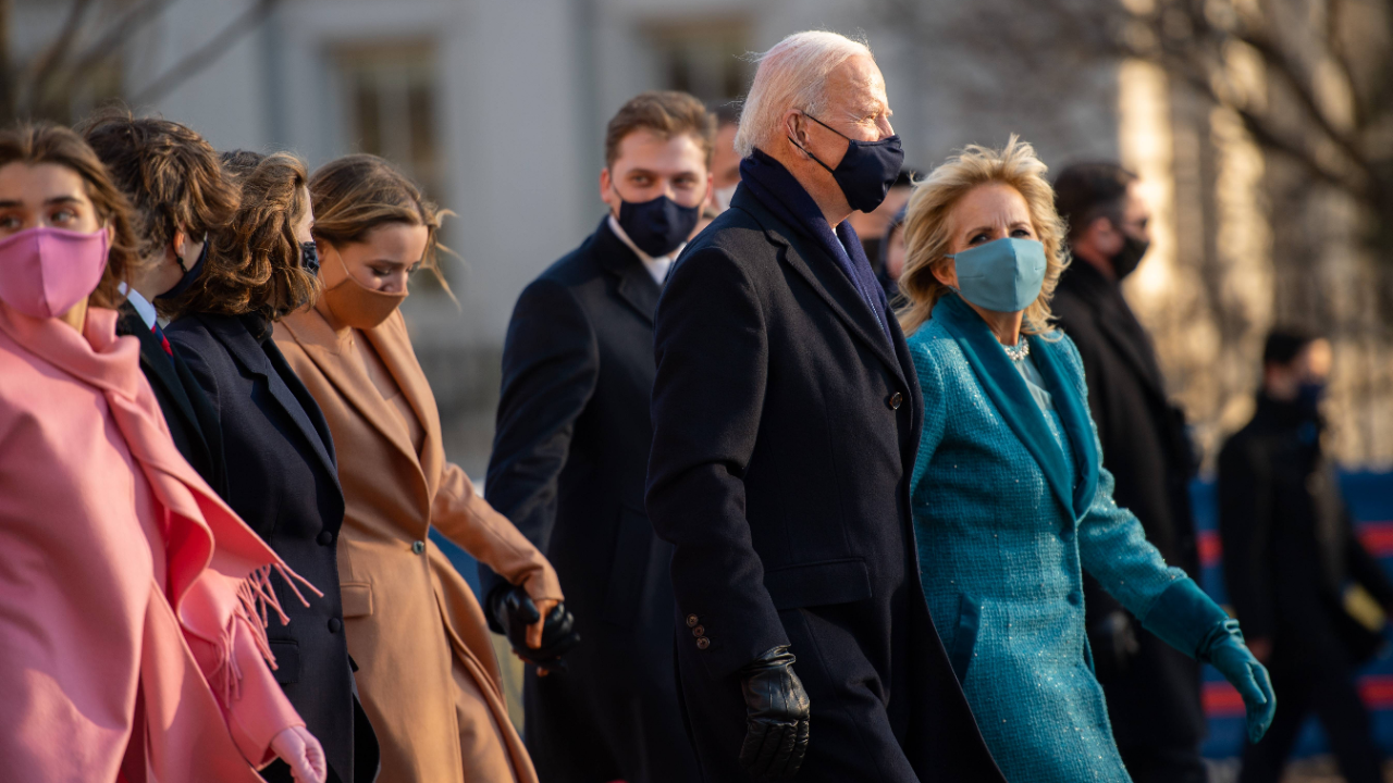 President Joe Biden, First Lady Dr. Jill Biden and family walk the abbreviated parade route after Biden's inauguration in Washington, DC. Credit: AFP Photo