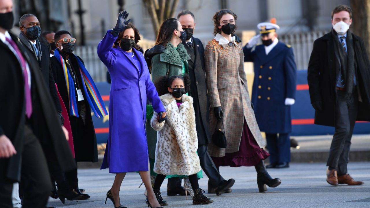 Vice President Kamala Harris, husband Doug Emhoff, her great niece Amara, and family members walk the abbreviated parade route after US President Joe Biden's inauguration in Washington, DC. Credit: AFP Photo