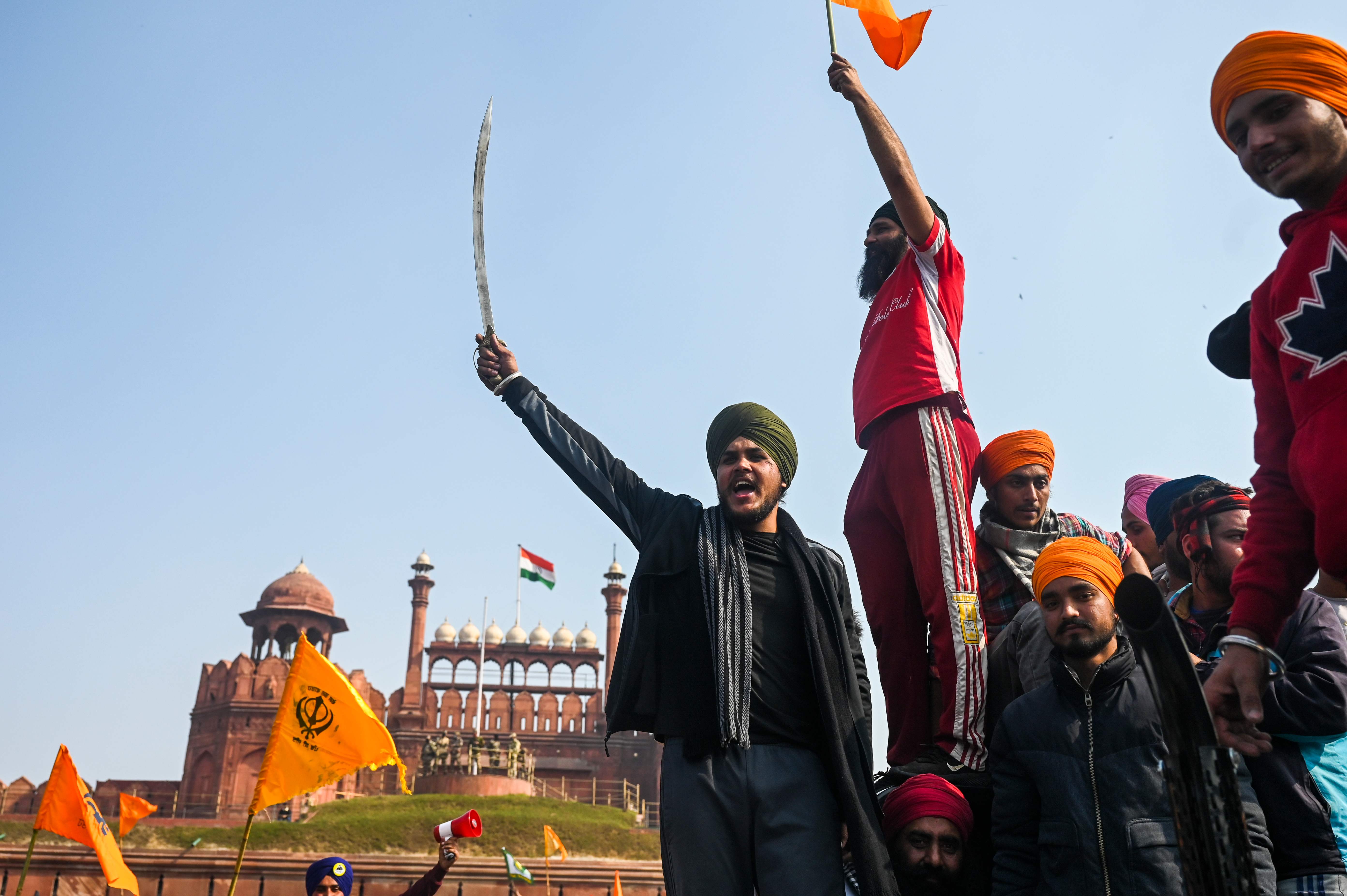 The Delhi Police had permitted the farmers protesting the three farm laws to hold their tractor parade on selected routes only after the official Republic Day parade on the Rajpath concludes. However, farmers deviated from the designated route for the proposed tractor parade against the new farm laws and moved toward ITO in central Delhi. Credit: AFP
