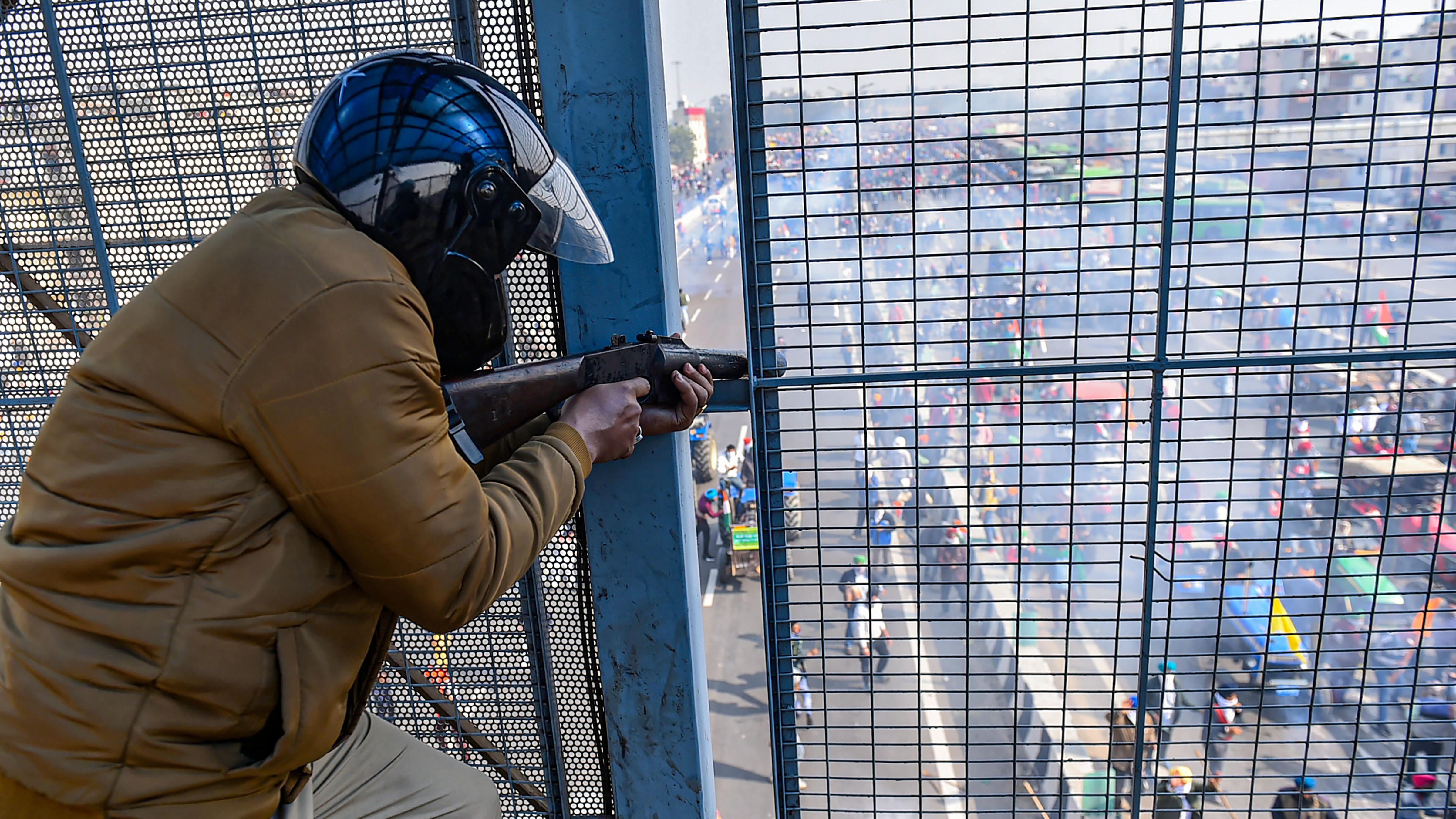 Security forces were far outnumbered and reduced to bystanders as tractors continued to roll into the capital from various border points. Credit: PTI