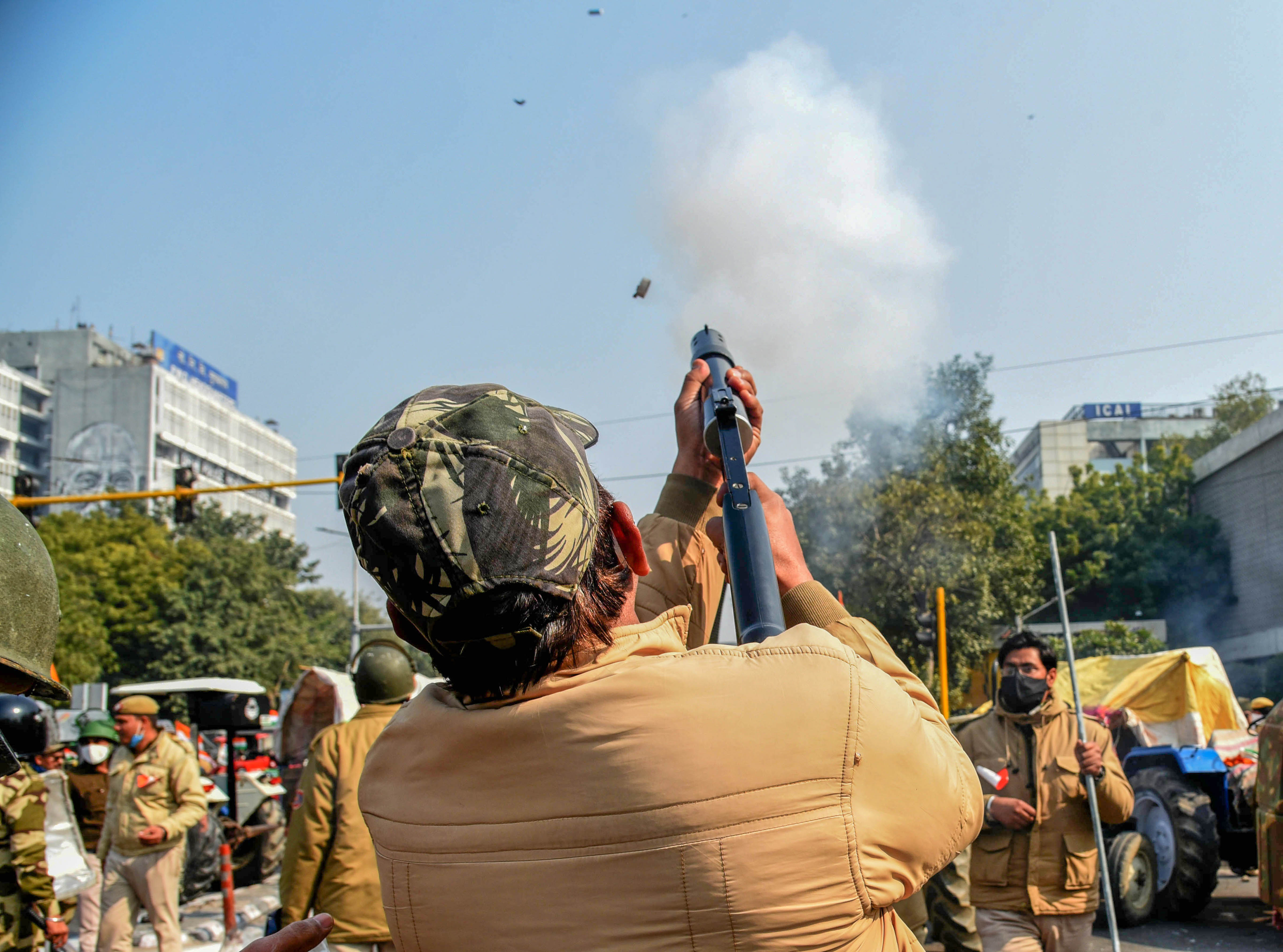 Police lathi charged farmers at Chintamani Chowk in Shahdara when they broke barricades and smashed window panes of cars. A group of 'Nihangs' (traditional Sikh warriors) clashed with security personnel near Akshardham Temple. Credit: PTI