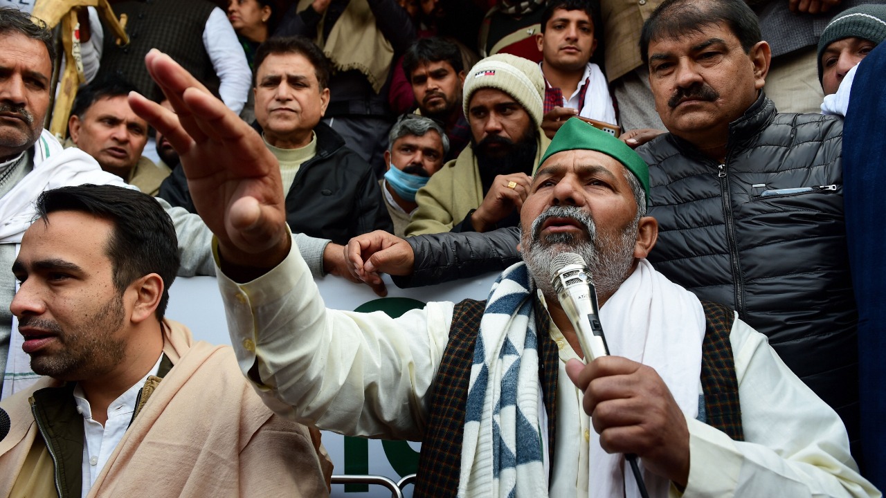 Flanked by supporters at 1 am, Tikait remained at the centrestage of the protest site — the Delhi-Meerut Expressway, which has been barricaded from both sides, prohibiting regular traffic movement. Credit: PTI Photo
