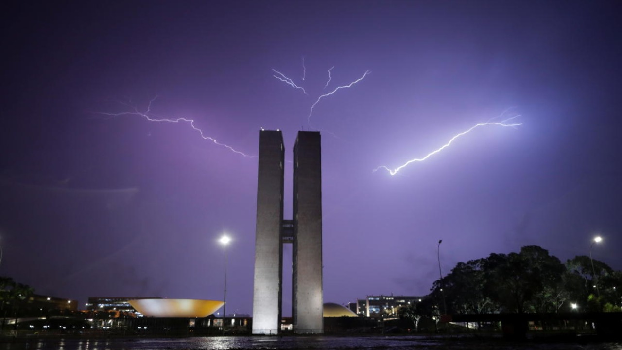 Lightning illuminates the sky above the National Congress in Brasilia, Brazil February 3, 2021. Credit: Reuters.