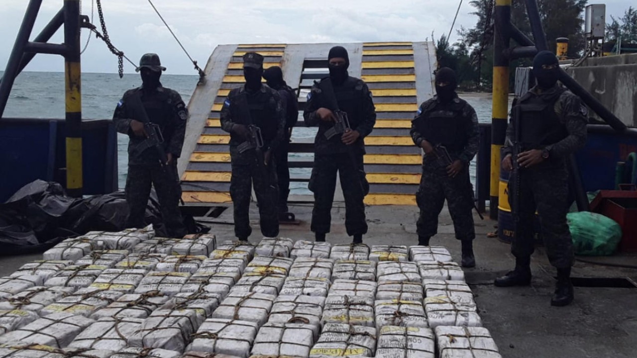Special Naval Forces members custody at least 1,400 kilos of cocaine seized on a boat in Trujillo, Colon department, in the northern Caribbean coast of Honduras, on February 3, 2021. Credit: AFP/Honduran Armed Forces Public Relations.
