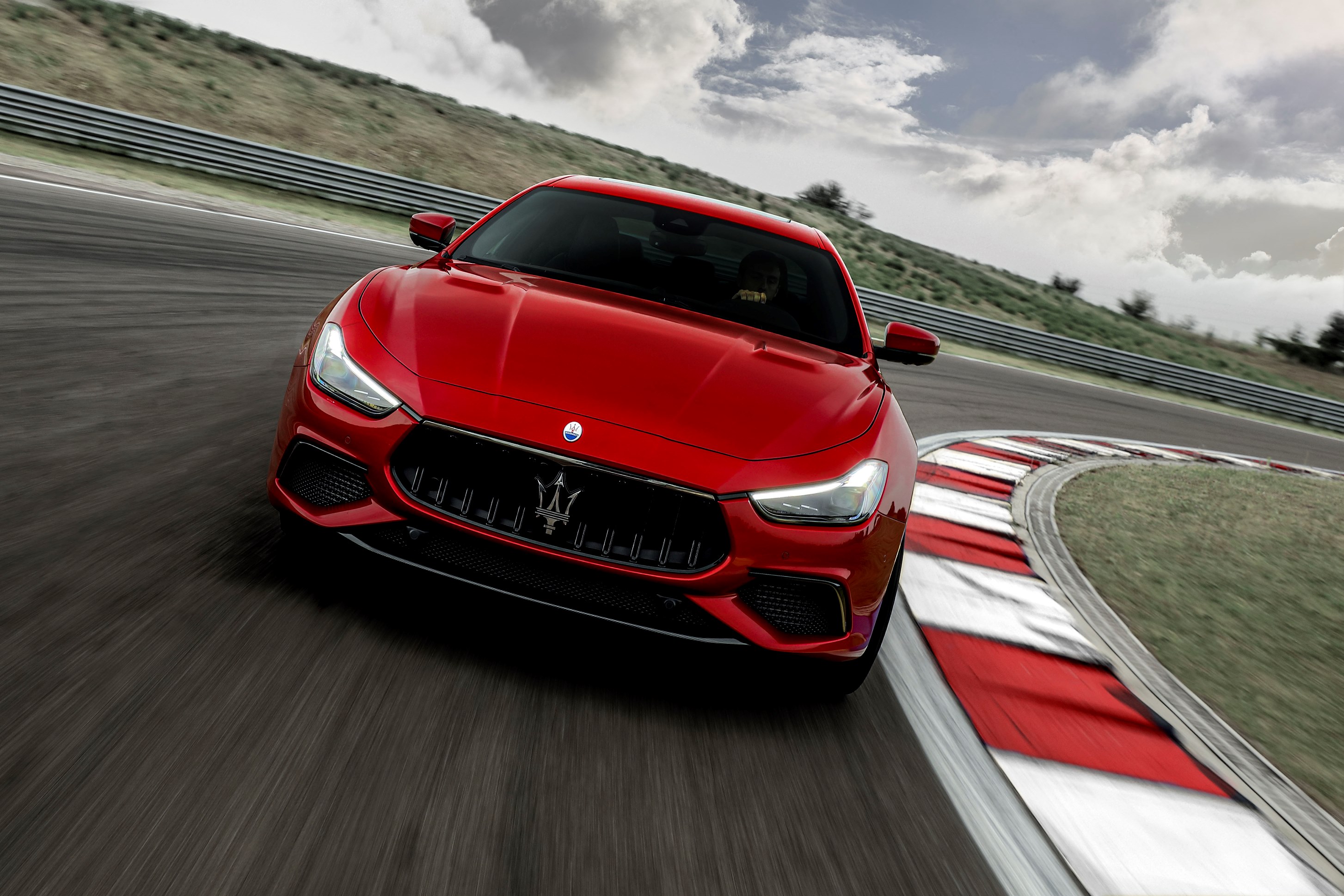 Exterior | The 2021 Ghibli sports a redesigned grille and iconic Maserati trident which makes for a striking frontside view. Credit: Maserati.