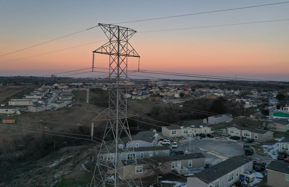 An aerial view from a drone shows electrical lines running through a neighbourhood on February 19, 2021, in Austin, Texas. Credit: AFP photo.