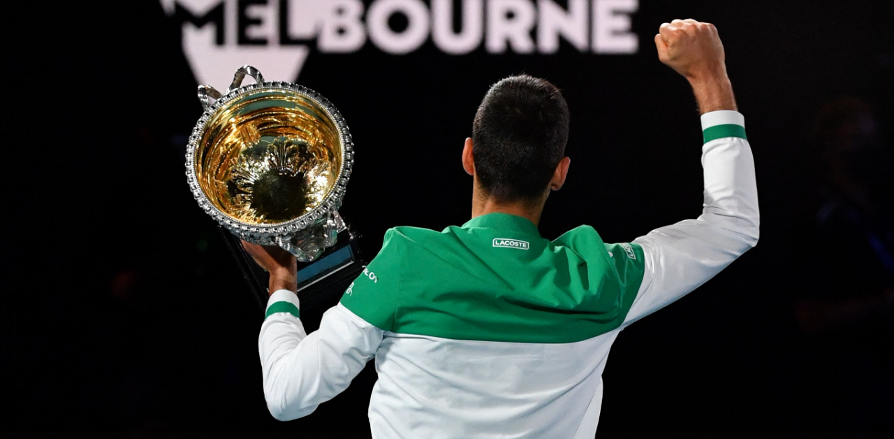 Novak Djokovic has won 18 Grand Slam titles of the 28 finals he has played, trailing behind Rafael Nadal and Roger Federer, both of whom have won 20 each in the Open era. Djokovic is one of the 8 players to have achieved the Career Grand Slam. He is also the only male player to hold all four Grand Slams on three different surfaces at once. Credit: AFP Photo