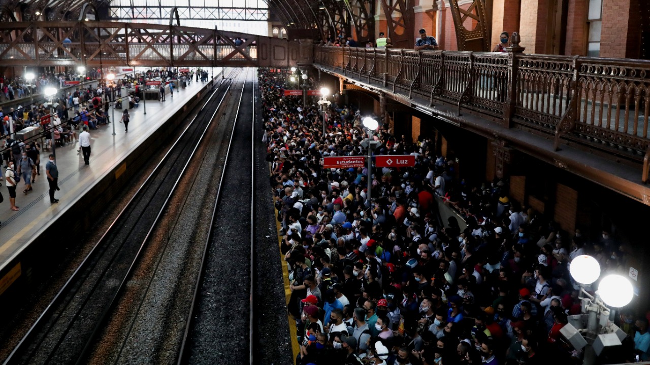 People gather to board a train at Luz station during the outbreak of the coronavirus disease in Sao Paulo, Brazil. Credit: Reuters Photo
