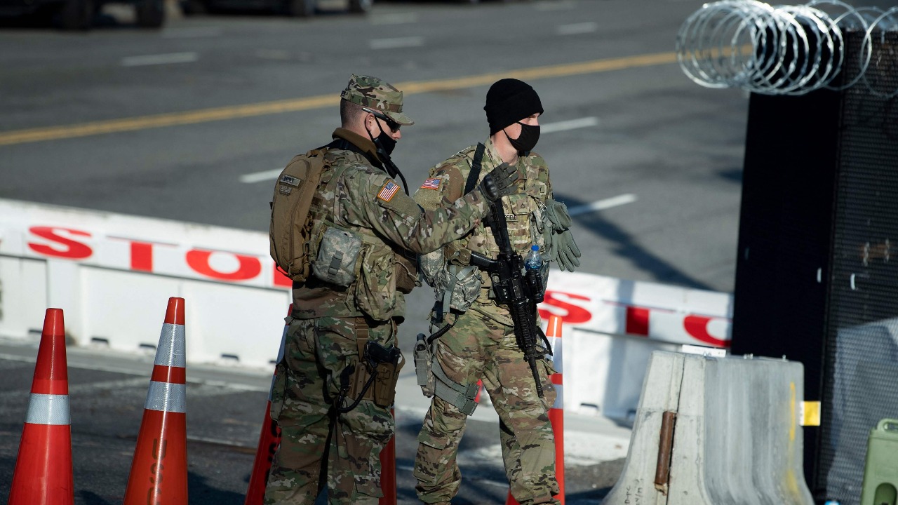 The grounds of the US Capitol were ringed with boosted security Thursday after officials warned of an attack plot by QAnon conspiracists, two months after backers of ex-president Donald Trump stormed the Capitol building. Credit: AFP Photo