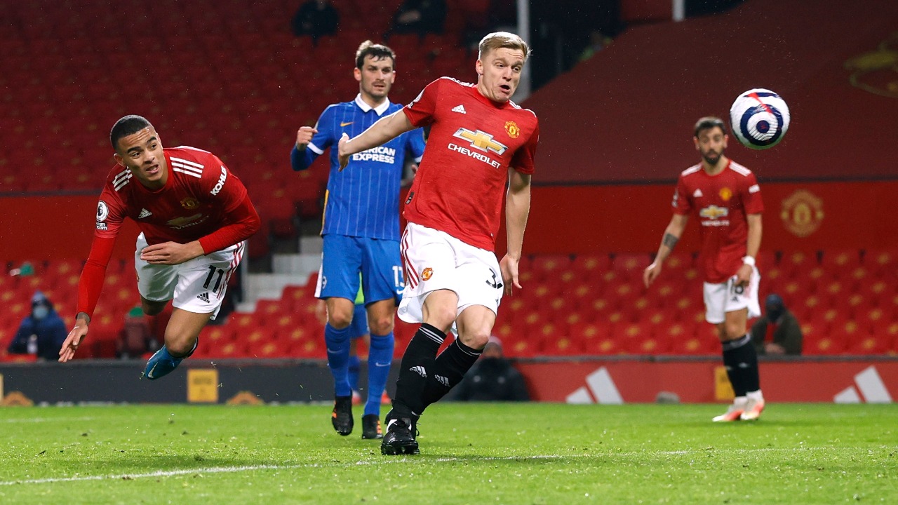 Manchester United's Mason Greenwood (L) heads home their winner in a 2-1 win over Brighton Hove and Albion in the English Premier League. Credit: Reuters Photo