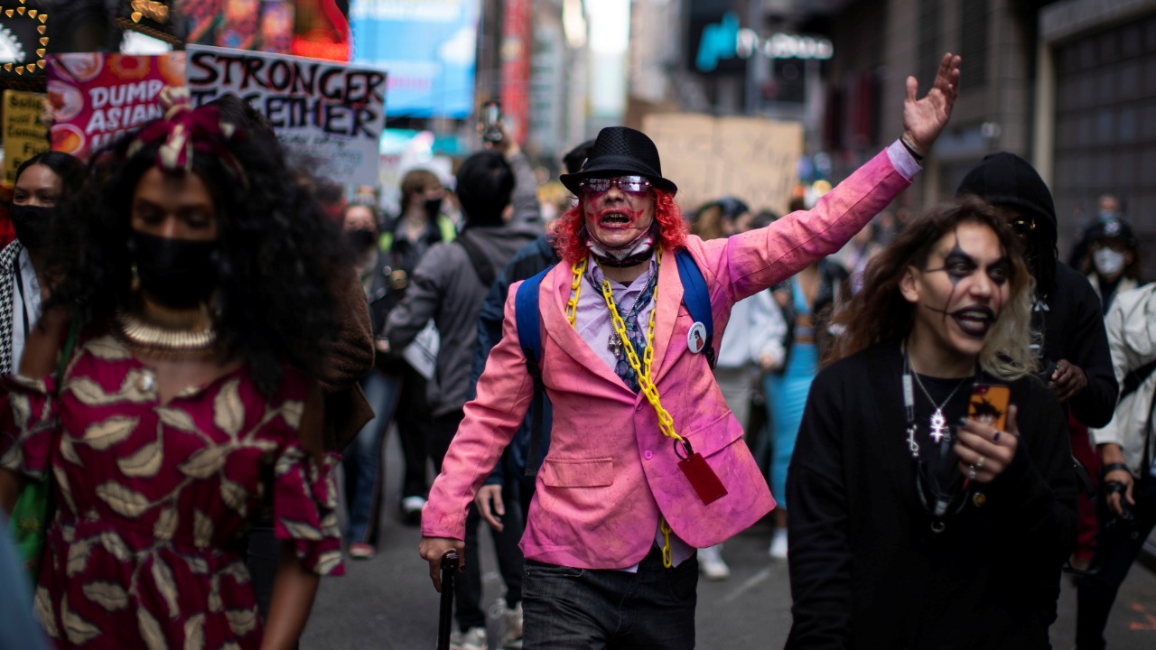 People march through Times Square during a Stop Asian Hate rally in New York City, US. Credit: Reuters Photo