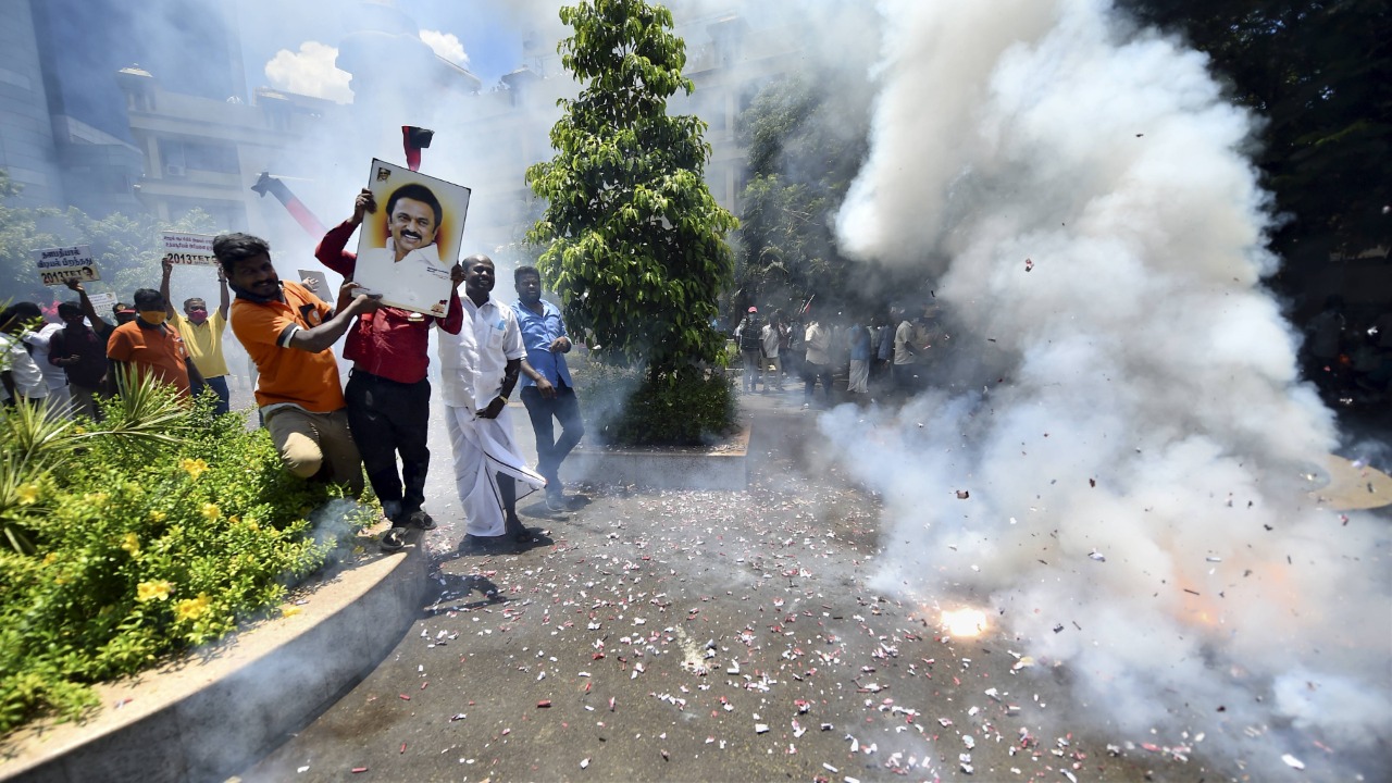 Party workers gathered outside the DMK's headquarters to celebrate the win.